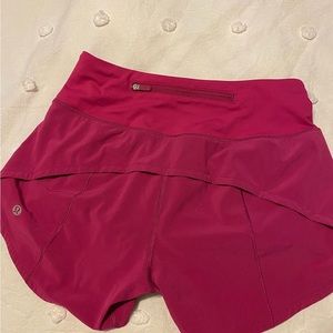 Lululemon  Size 2
“4 inch”  Speed Ups Mid Rise
Color: Ripened raspberry